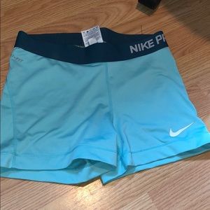 Light blue nike pros